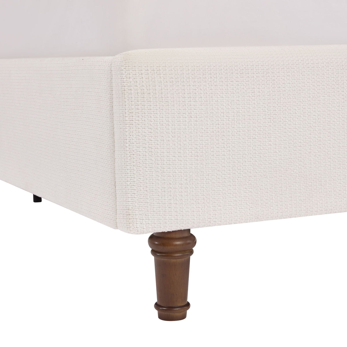Harper upholstered bed beige fabric with dark wood turned leg on Tampa Home & Garden Store