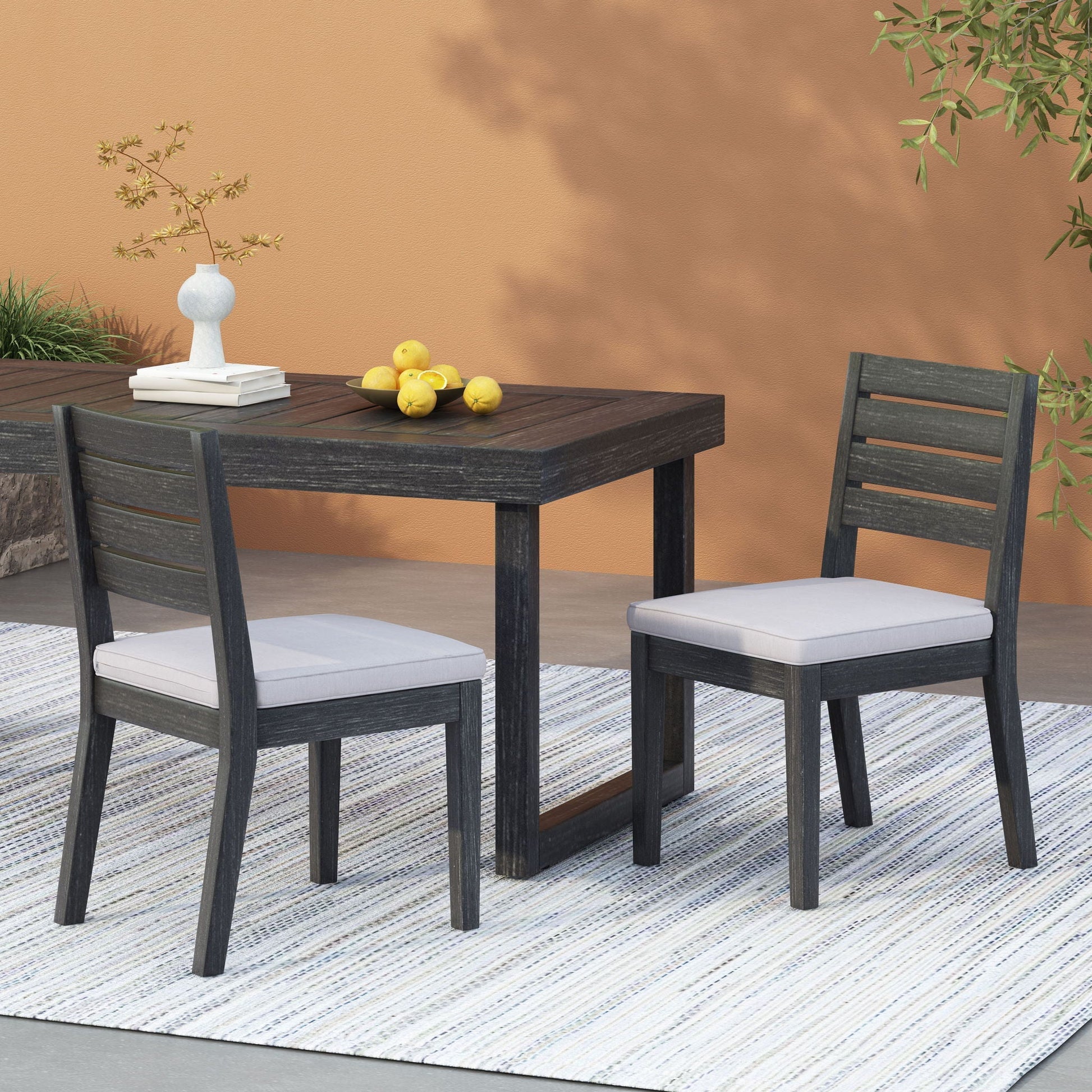 Outdoor Armless Dining Chair With Cushions, dark wood frame and gray cushions on Tampa Home & Garden Store