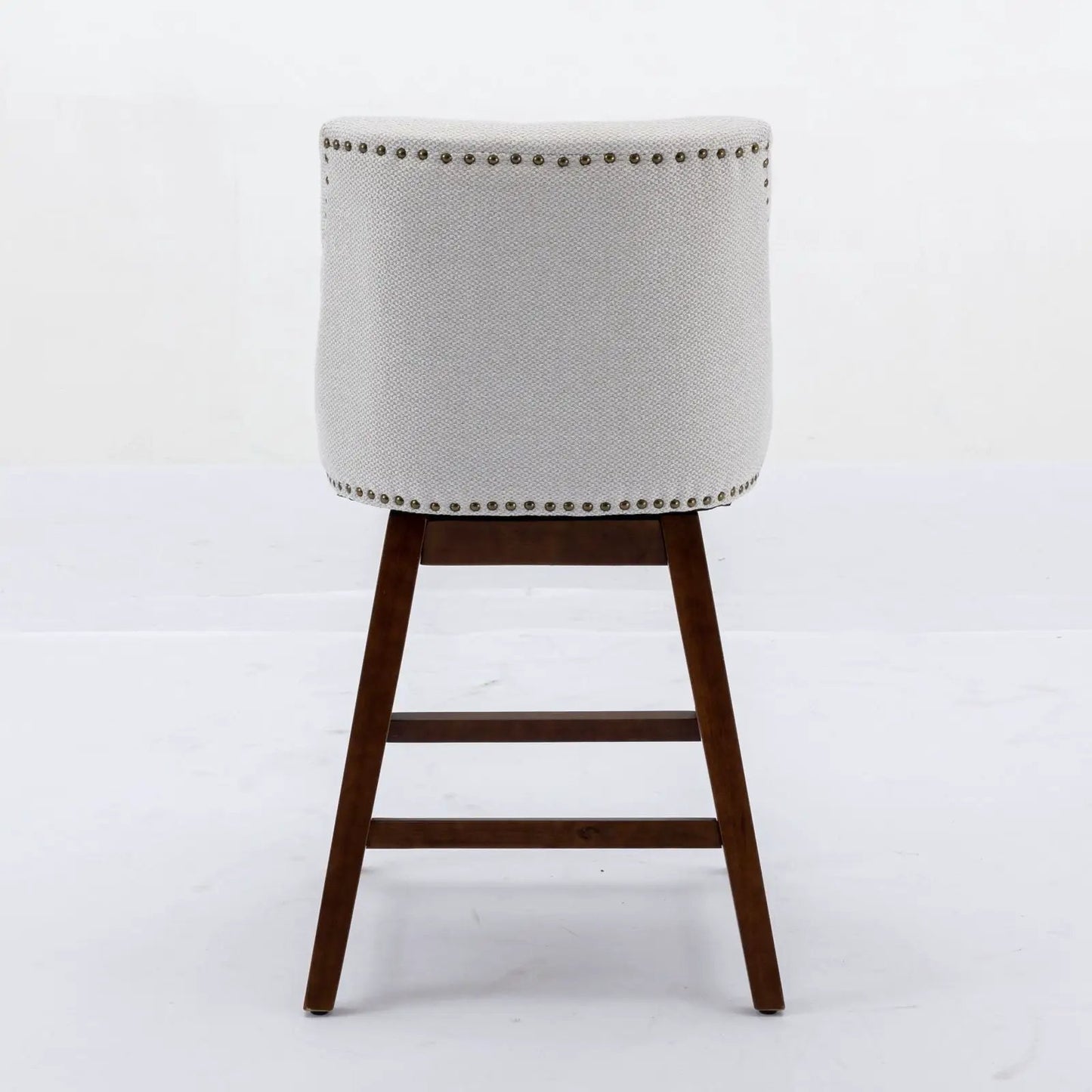 Counter height swivel barstool 26in, light gray fabric, nailhead trim, dark wood legs on Tampa Home & Garden Store