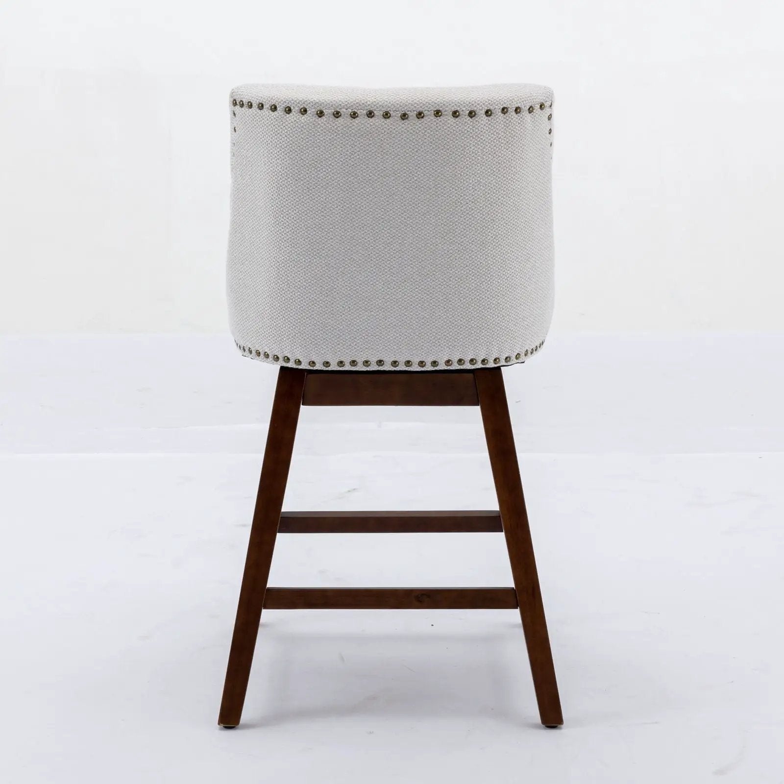 Counter height swivel barstool 26in, light gray fabric, nailhead trim, dark wood legs on Tampa Home & Garden Store