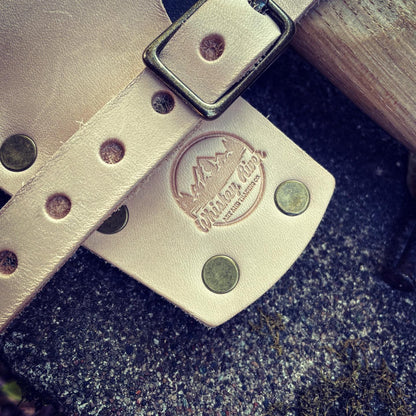 Universal Small Leather Mask beige leather strap with buckle and Whiskey River Art & Trading logo on Tampa Home & Garden Store