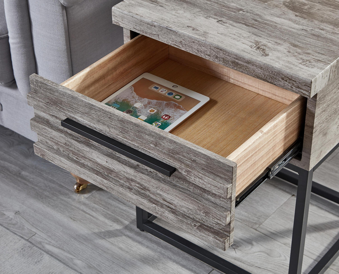 Astral 3-Piece Upholstered Bedroom Set nightstand drawer in weathered wood with tablet inside on Tampa Home & Garden Store