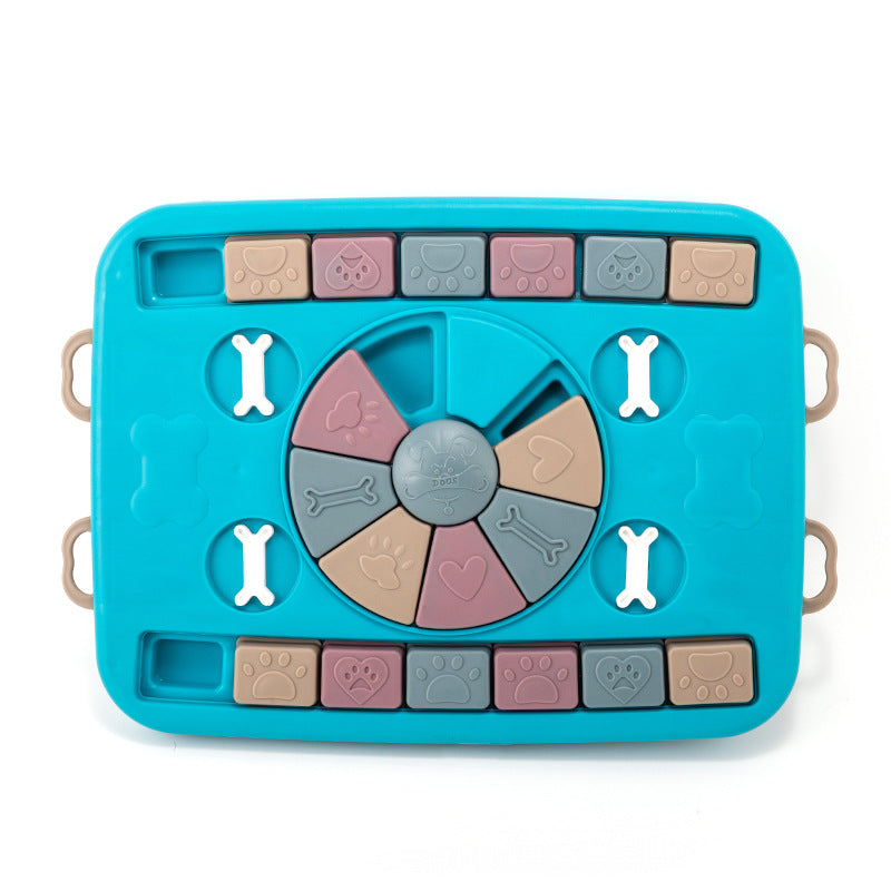 Interactive blue plastic dog puzzle toy with rotating center and bone blocks by Sell My Stuff on Tampa Home & Garden Store