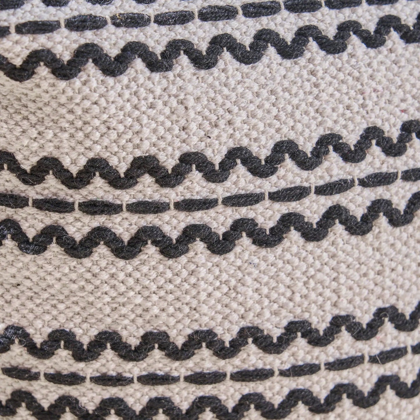 Lani Handcrafted Cotton Pouf natural with black dotted stripe pattern close-up on Tampa Home & Garden Store