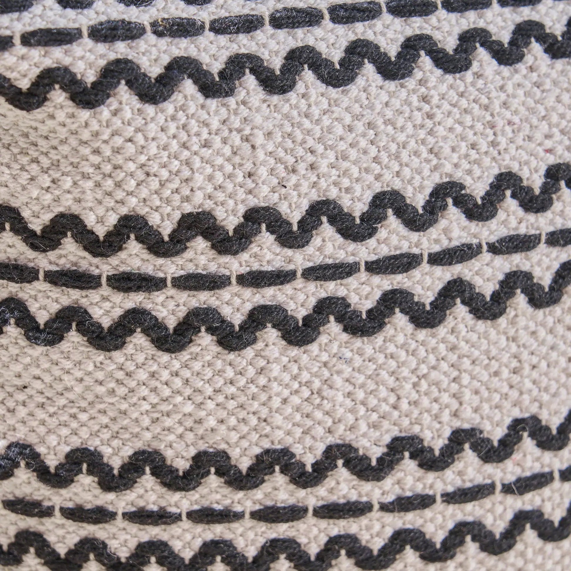 Lani Handcrafted Cotton Pouf natural with black dotted stripe pattern close-up on Tampa Home & Garden Store