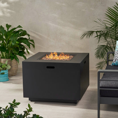 Outdoor square iron gas-burning fire pit, black finish, 24x31 in with flames and lava rocks on Tampa Home & Garden Store