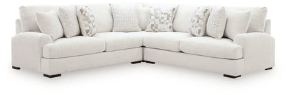 Misty-Lakes sectional sofa in light beige fabric with geometric patterned throw pillows on Tampa Home & Garden Store