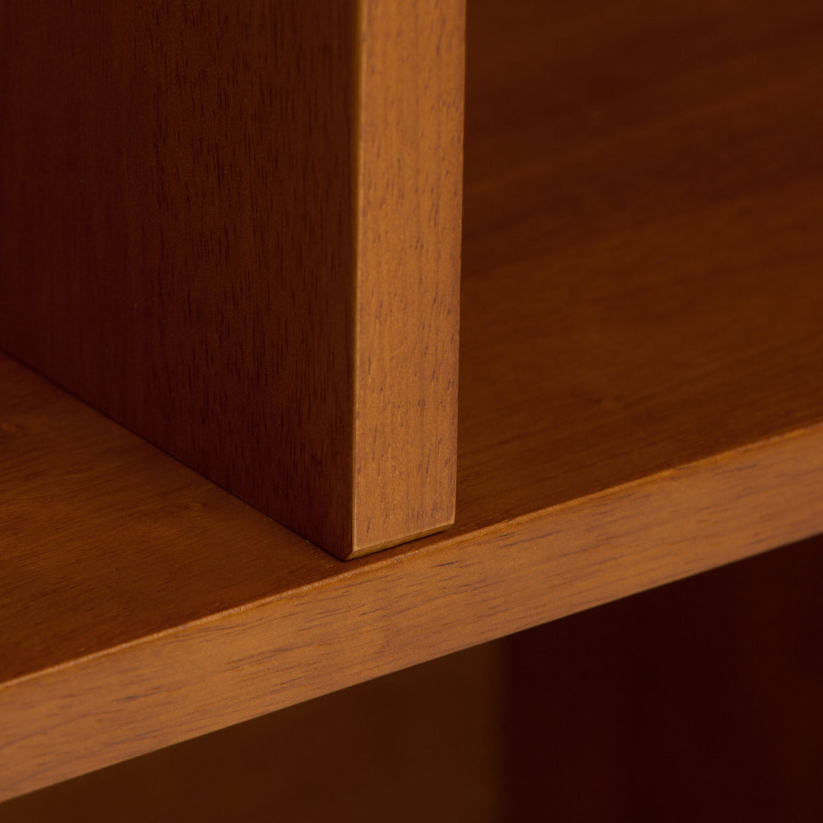 Mid Century Wide Bookcase and Storage Drawers by HouseOfZazla; warm brown wood edge close-up on Tampa Home & Garden Store