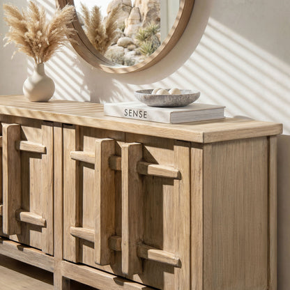 Natural four-door sideboard with carved handles in light wood finish and mirror on Tampa Home & Garden Store