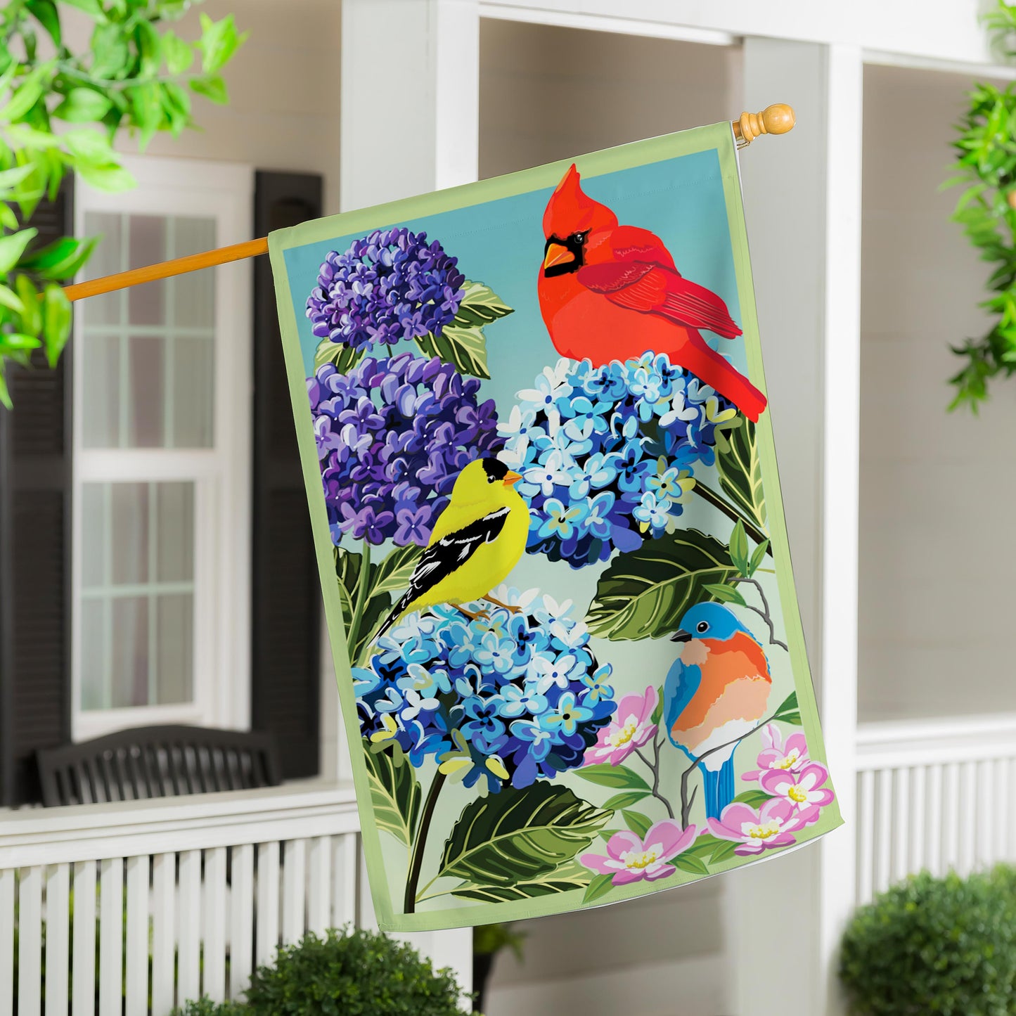 Songbird Sonata Applique House Flag with red cardinal and yellow bird beside hydrangeas by Evergreen on Tampa Home & Garden Store