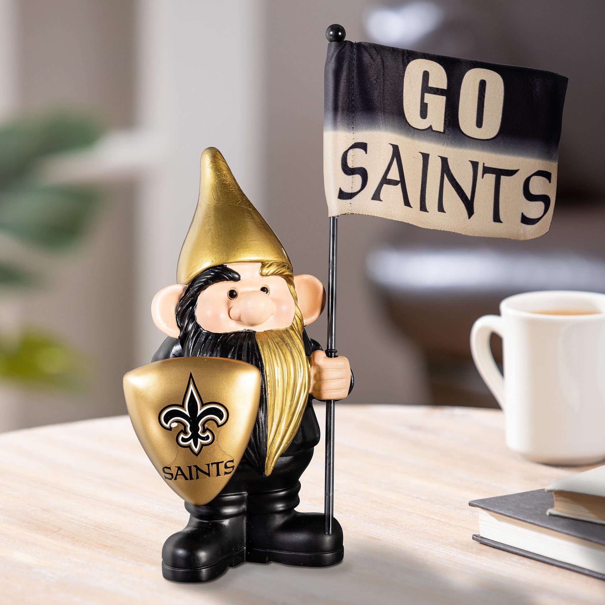 New Orleans Saints flag holder garden gnome with fleur-de-lis shield, gold/black outfit on Tampa Home & Garden Store