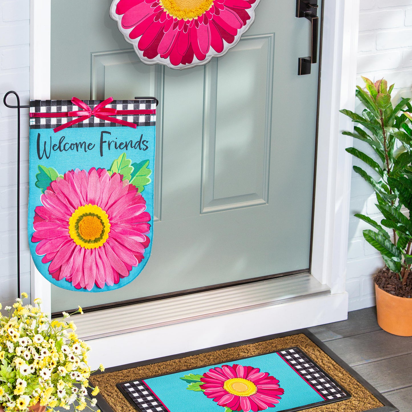 Welcome Friends Daisy Burlap Garden Flag with pink flower on turquoise panel checkered edge on Tampa Home & Garden Store