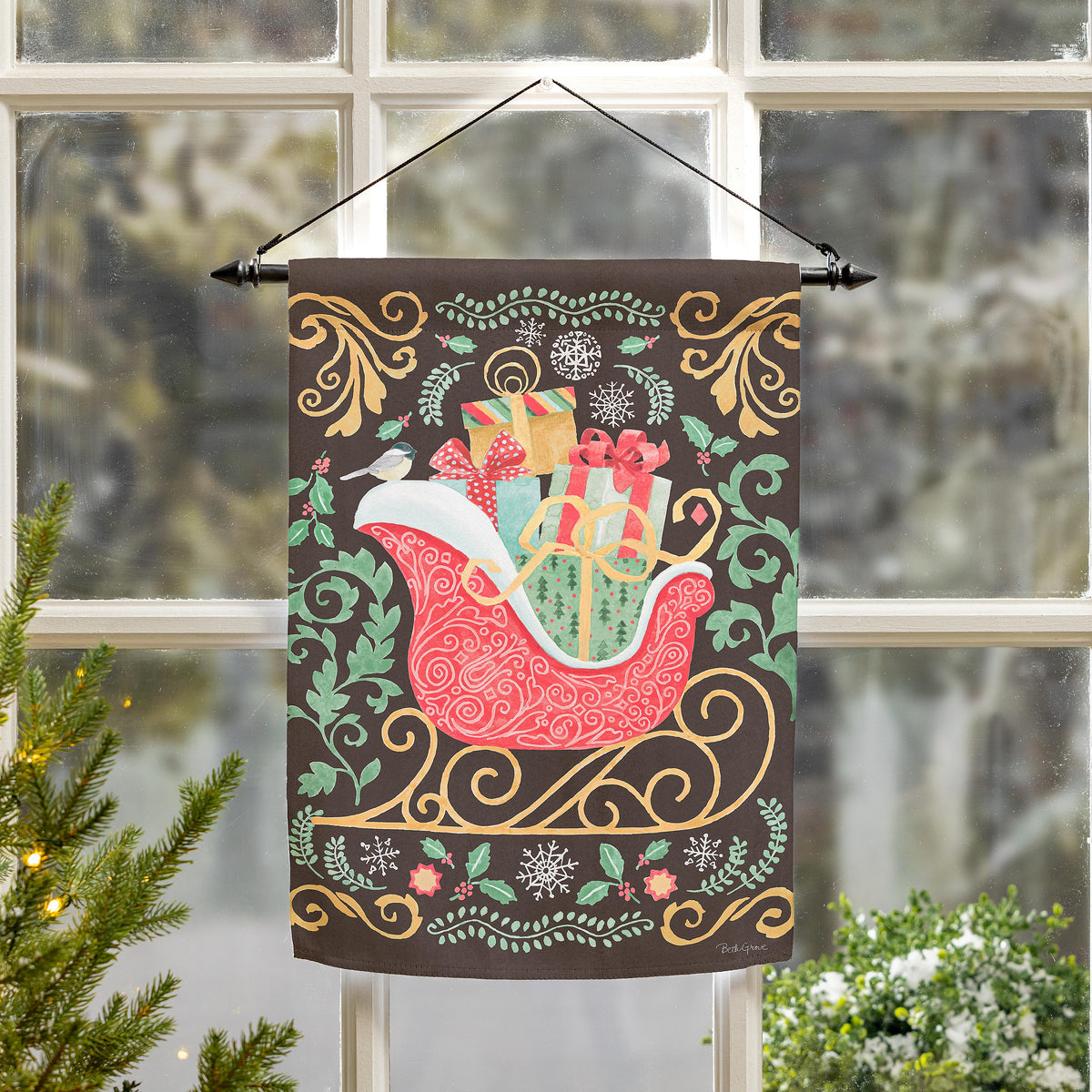 Nutcracker & Sleigh Suede Garden Flag Evergreen with brown background and gold swirls on Tampa Home & Garden Store