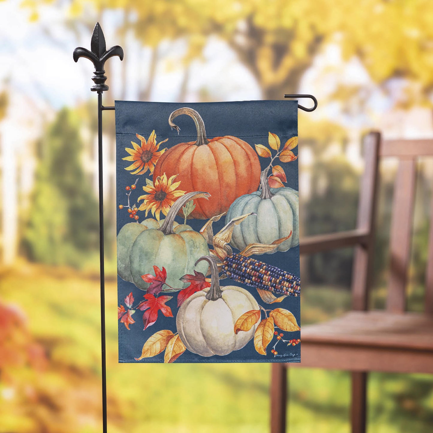 All Things Pumpkins Suede Garden Flag featuring pumpkins and autumn leaves on a blue background on Tampa Home & Garden Store