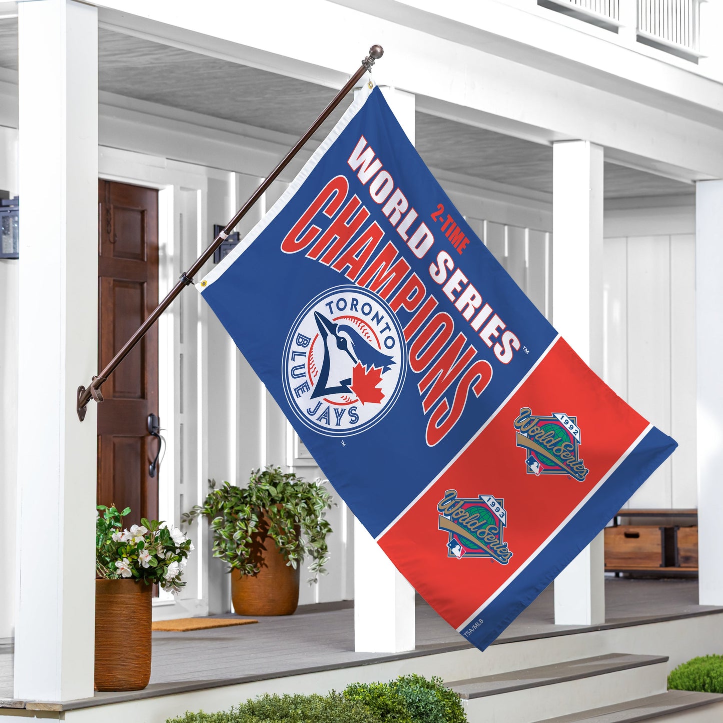 Toronto Blue Jays 3x5 single-sided sublimated flag with two grommets on a pole on Tampa Home & Garden Store
