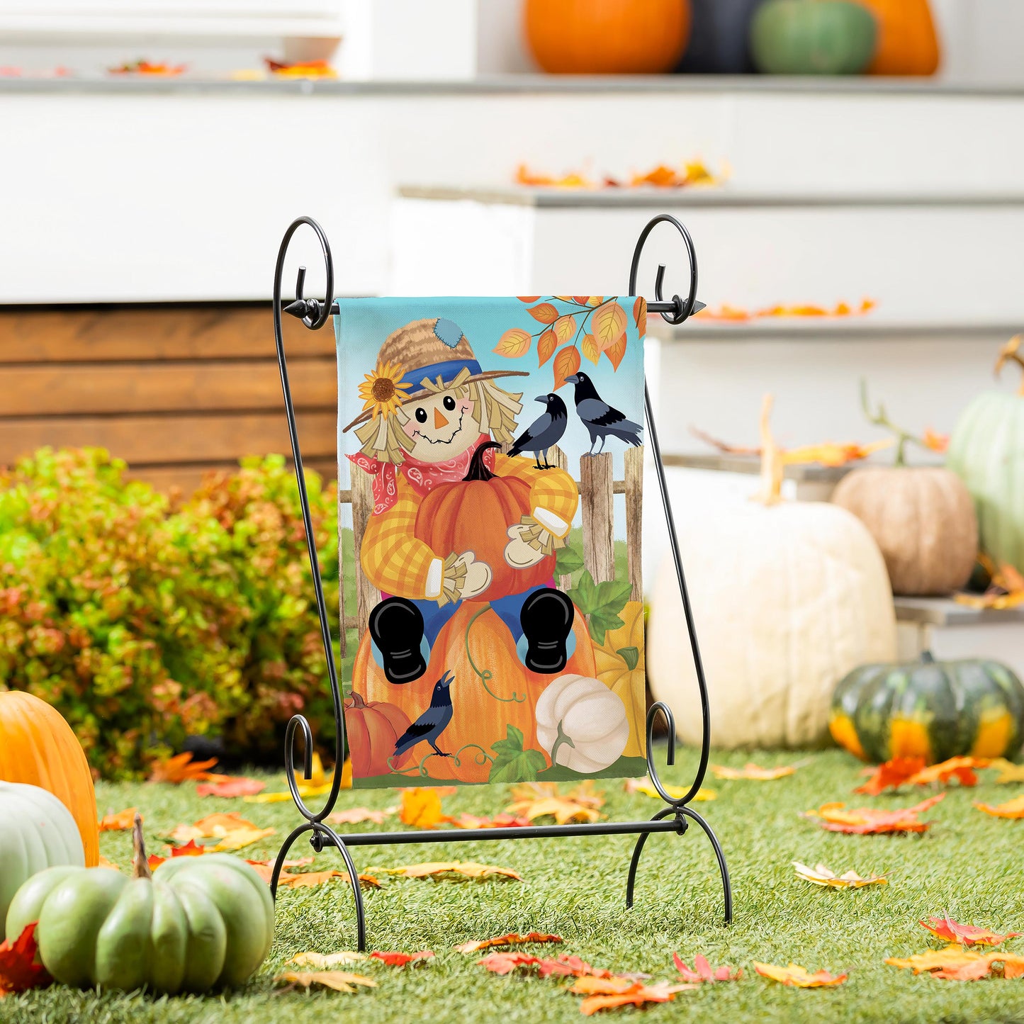 Friends & Scarecrow Suede Garden Flag blue fall design with pumpkins and crows on a stand on Tampa Home & Garden Store