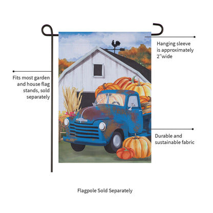 Barns & Harvest Suede Garden Flag with pumpkins and a blue truck beside a barn on Tampa Home & Garden Store