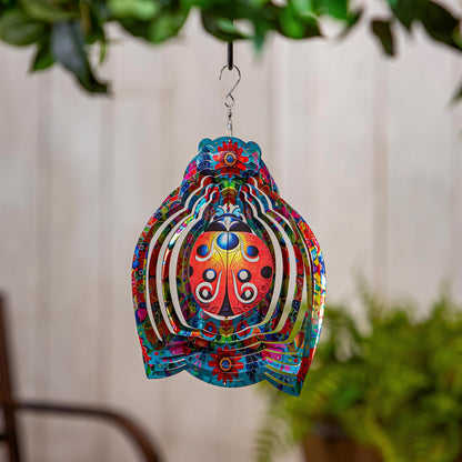 Illusion Spinner Edge Program wind spinner with vibrant multicolor floral design on Tampa Home & Garden Store