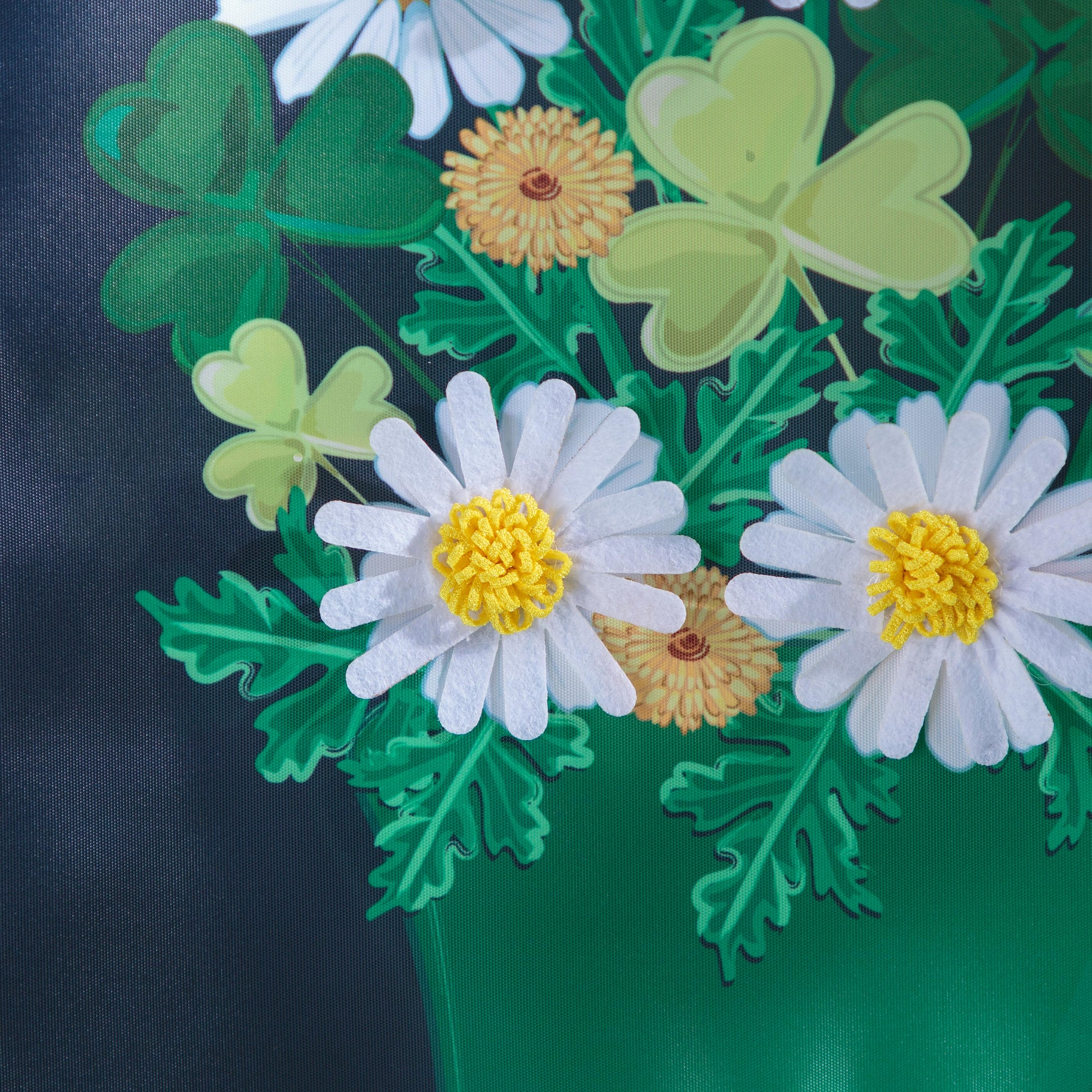 Happy St. Patrick's Day applique garden flag with white daisies and green leaves on Tampa Home & Garden Store