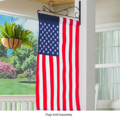 Swirl Wall-Mount House Flag Hanger in black metal holding an American flag on Tampa Home & Garden Store