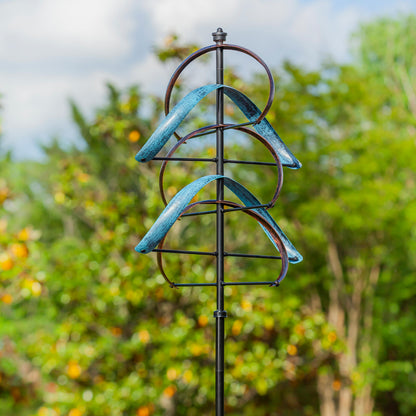 Evergreen wind spinner Towering Semicircle with turquoise blades on black pole 80 in tall on Tampa Home & Garden Store