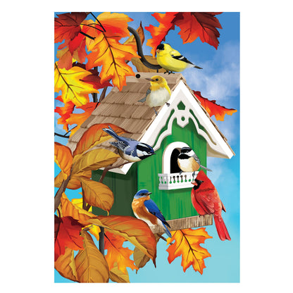 Colorful Bird House Suede Flag with yellow birds on a roof amid autumn leaves and blue sky on Tampa Home & Garden Store