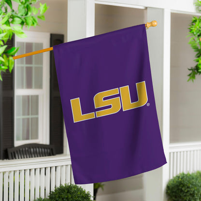 Louisiana State University applique flag in purple with gold LSU letters on wooden pole on Tampa Home & Garden Store
