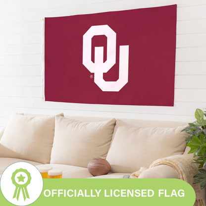 University of Oklahoma 3x5 ft single-sided flag with two grommets, white OU logo on maroon background on Tampa Home & Garden Store