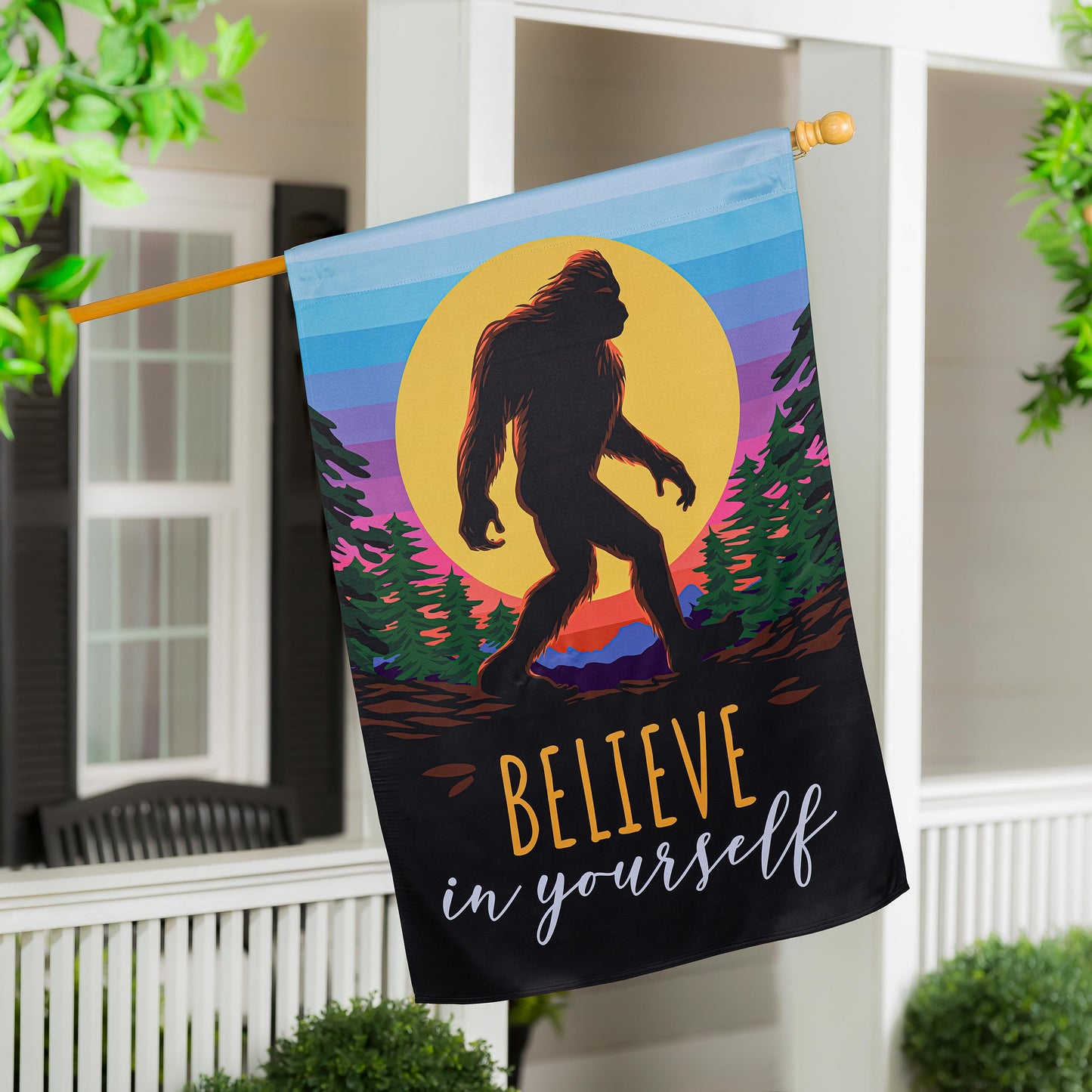 Big Foot Believe In Yourself suede house flag with blue sunset forest design on wooden pole on Tampa Home & Garden Store