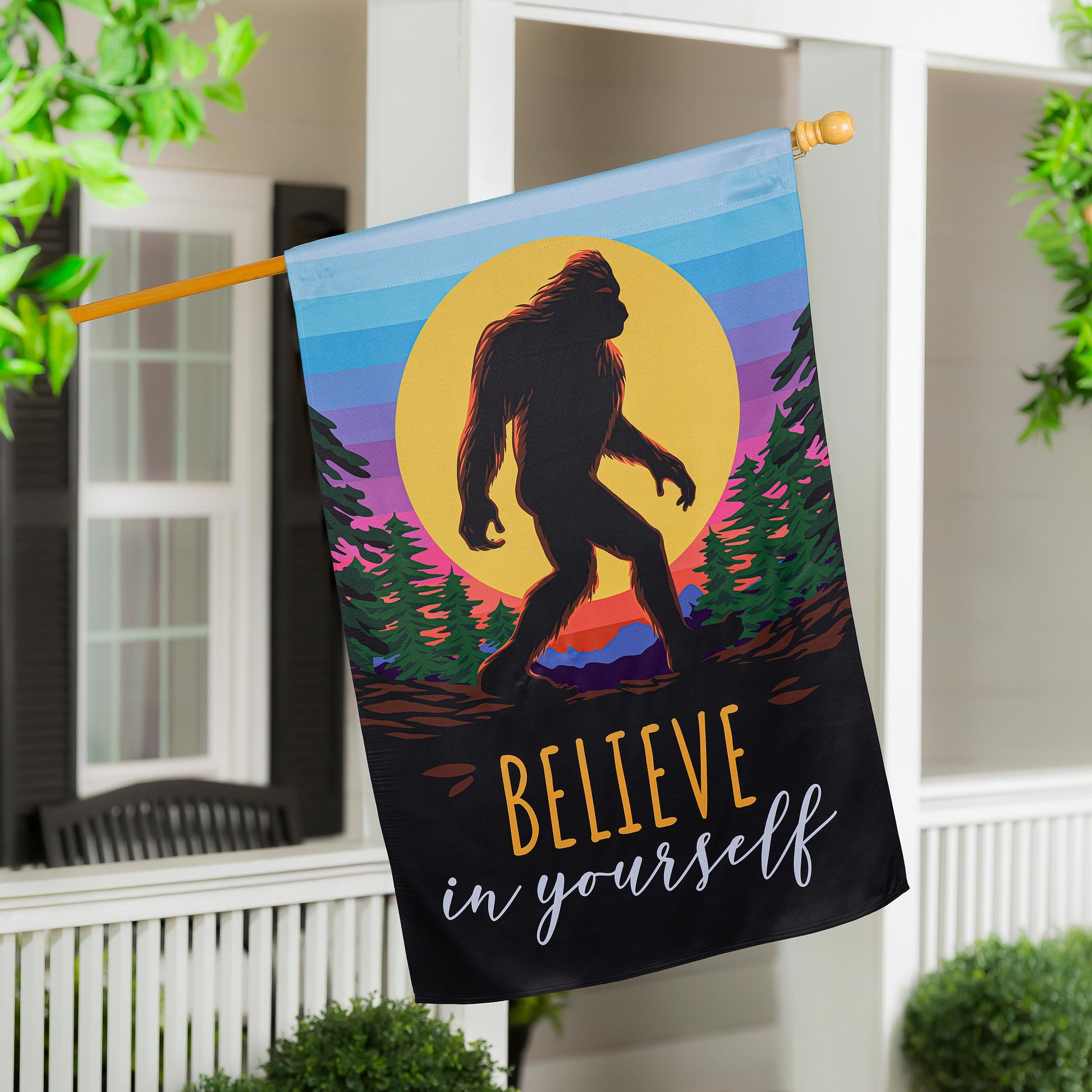 Big Foot Believe In Yourself suede house flag with blue sunset forest design on wooden pole on Tampa Home & Garden Store