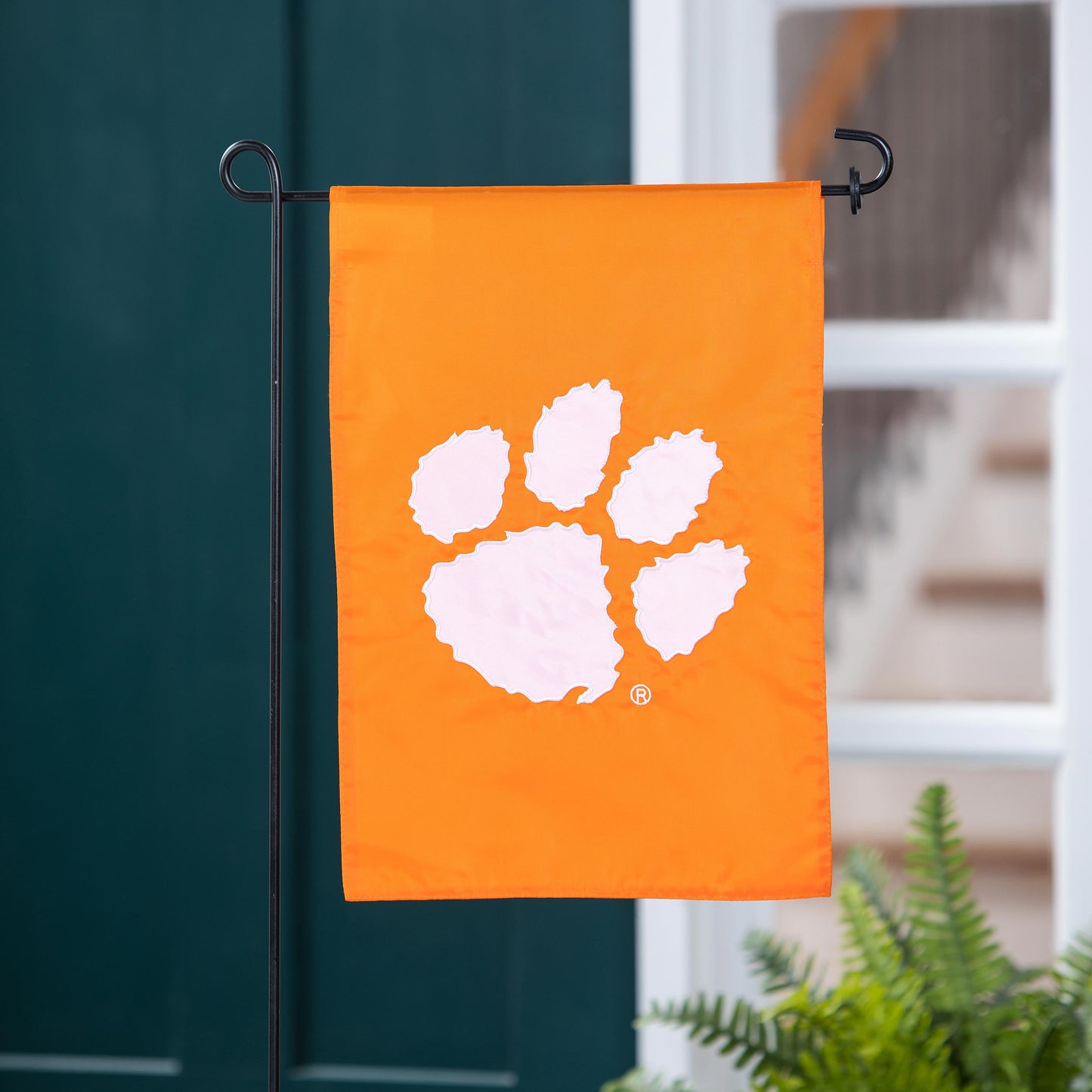 Clemson University applique garden flag orange with white paw-print motif on Tampa Home & Garden Store