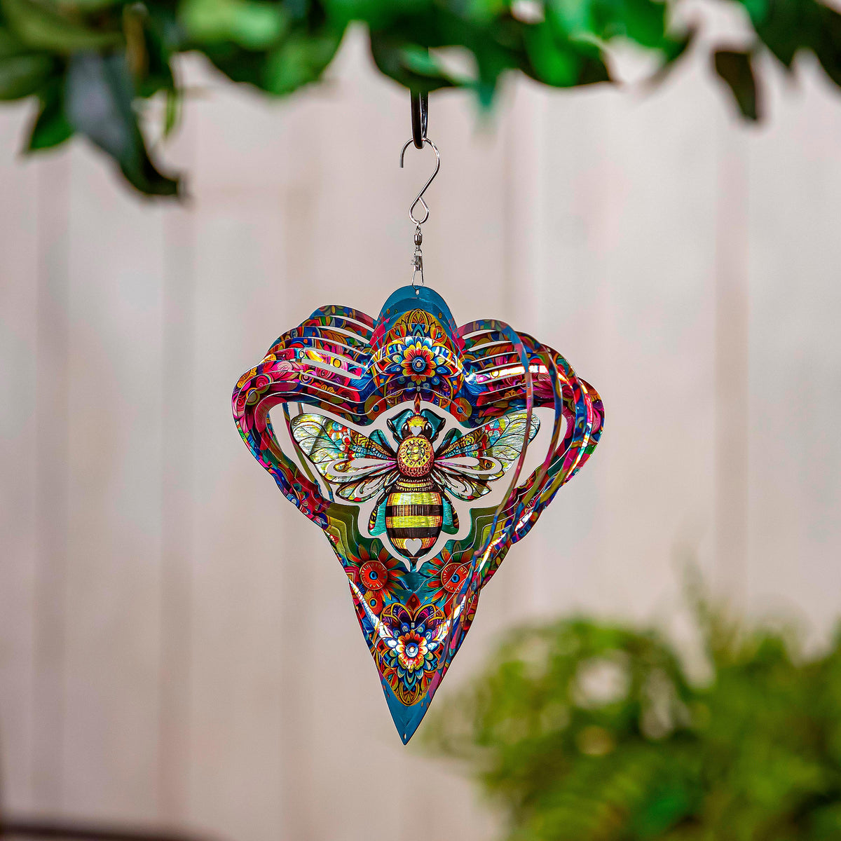 Illusion Spinner Edge Program wind spinner with vibrant multicolor butterfly-patterned blades on Tampa Home & Garden Store