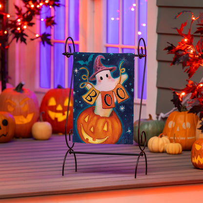 Boo Suede Garden Flag on black metal stand with pumpkin motif on dark blue background on Tampa Home & Garden Store