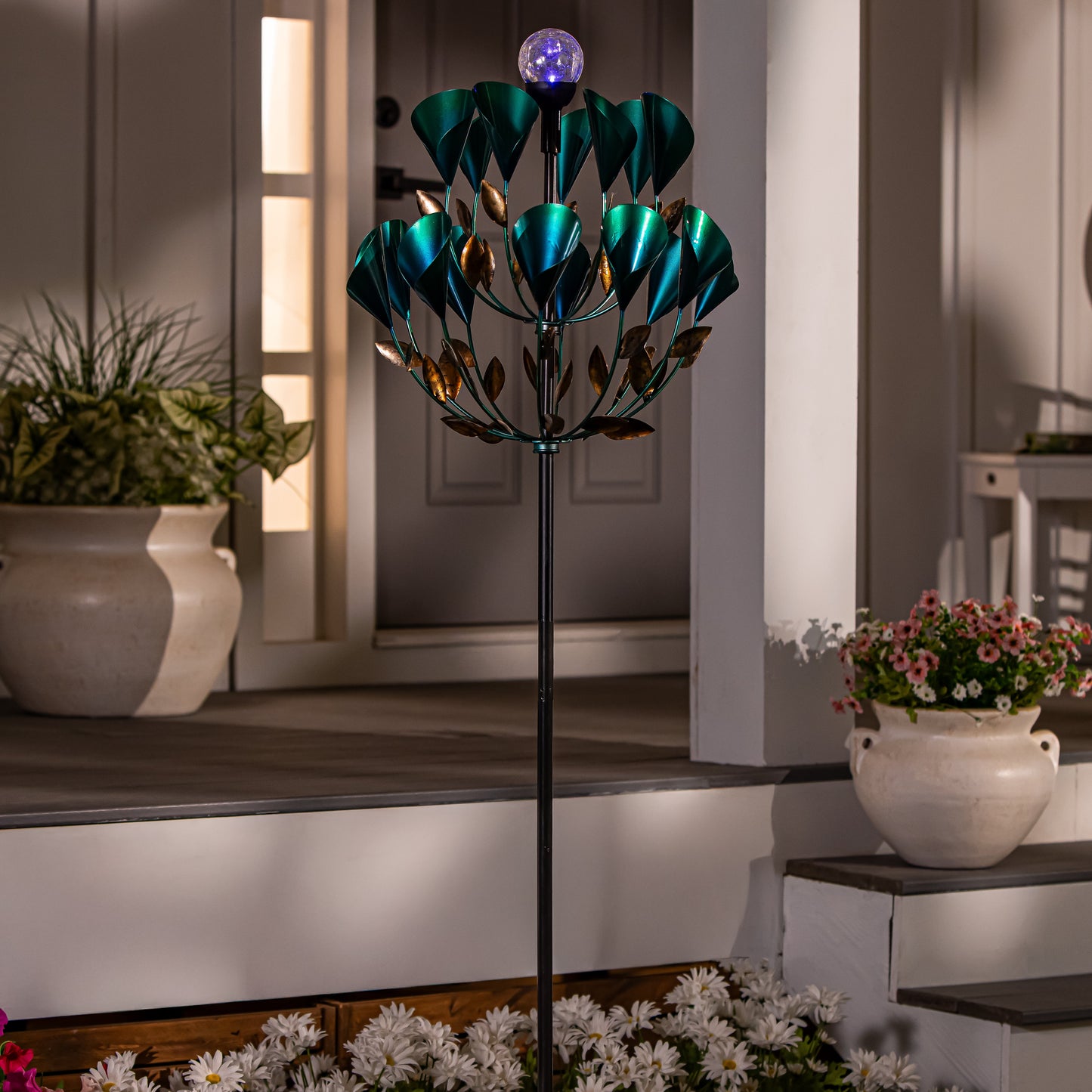 Solar metal wind spinner Calla Lily with teal blades, 74in tall by Evergreen on Tampa Home & Garden Store