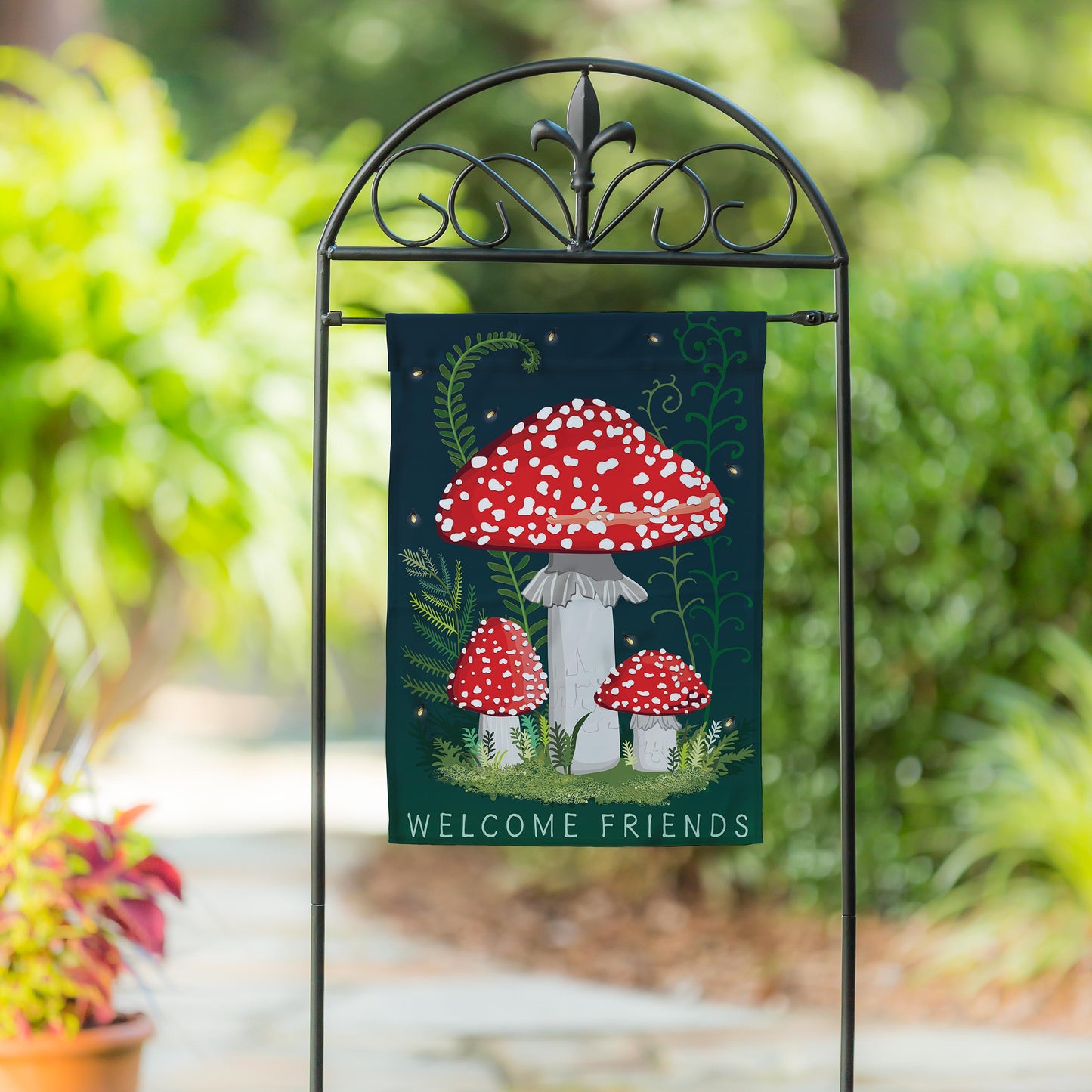 Linen garden flag Welcome Friends Mushrooms on dark teal background with red mushrooms and ferns on Tampa Home & Garden Store