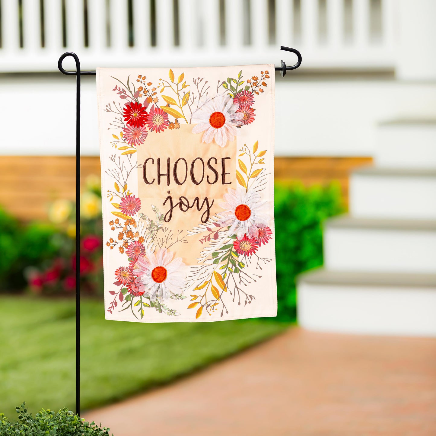 Choose Joy Applique Garden Flag with floral bouquet on peach backdrop on black stake on Tampa Home & Garden Store