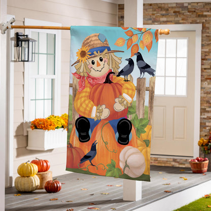 Friends & Scarecrow Suede House Flag with pumpkin, scarecrow, two crows and leaves on porch on Tampa Home & Garden Store