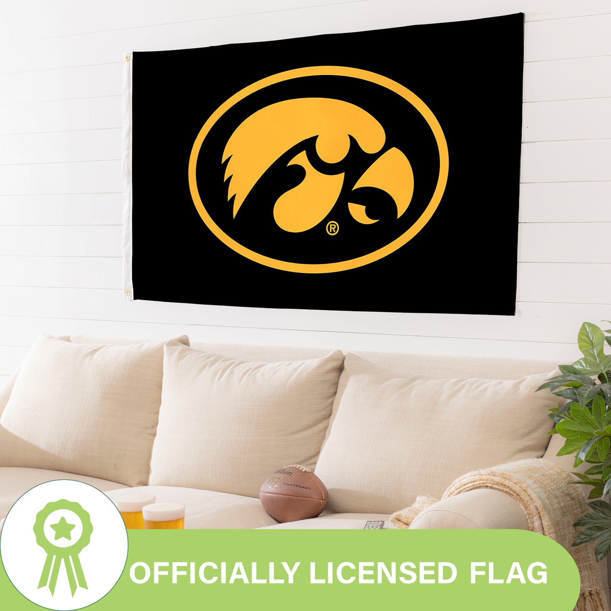 University of Iowa 3x5 estate flag with black field and yellow Hawkeye logo, 2 grommets on Tampa Home & Garden Store