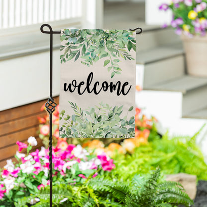 Greenery Welcome Burlap Garden Flag with leafy green pattern on metal stand on Tampa Home & Garden Store