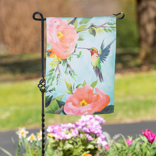 Hummingbird suede garden flag turquoise background with pink blooms and green leaves on Tampa Home & Garden Store