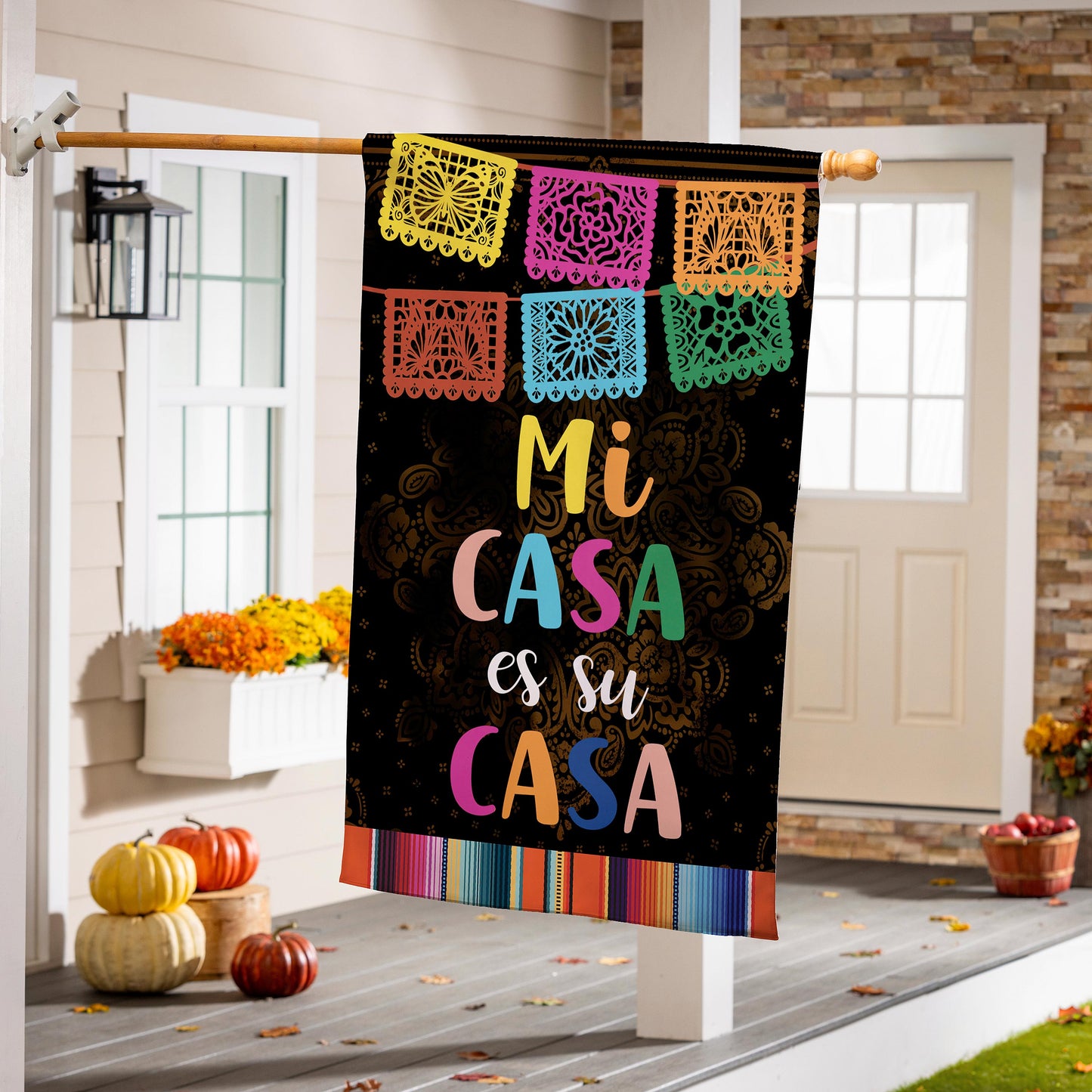 Mi Casa Es Su Casa suede house flag with colorful papel picado squares on black background on Tampa Home & Garden Store