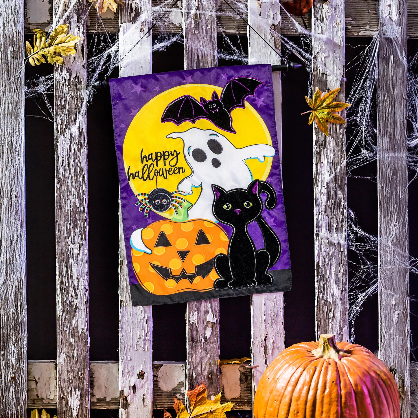 Halloween Friends Applique Garden Flag purple backdrop with ghost, bat, pumpkin and spider on Tampa Home & Garden Store