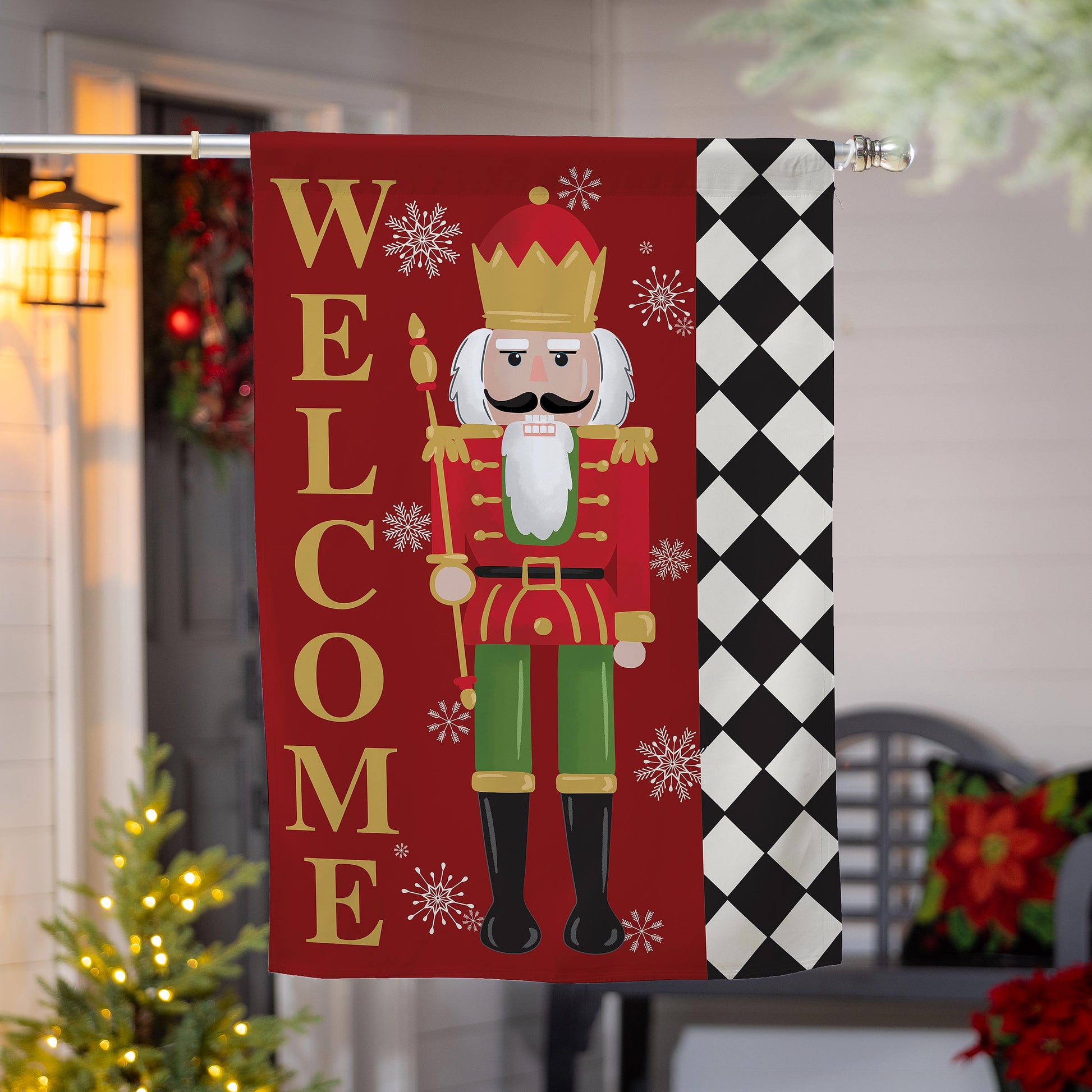 Welcome Nutcracker Suede House Flag red flag with gold lettering and nutcracker figure on Tampa Home & Garden Store