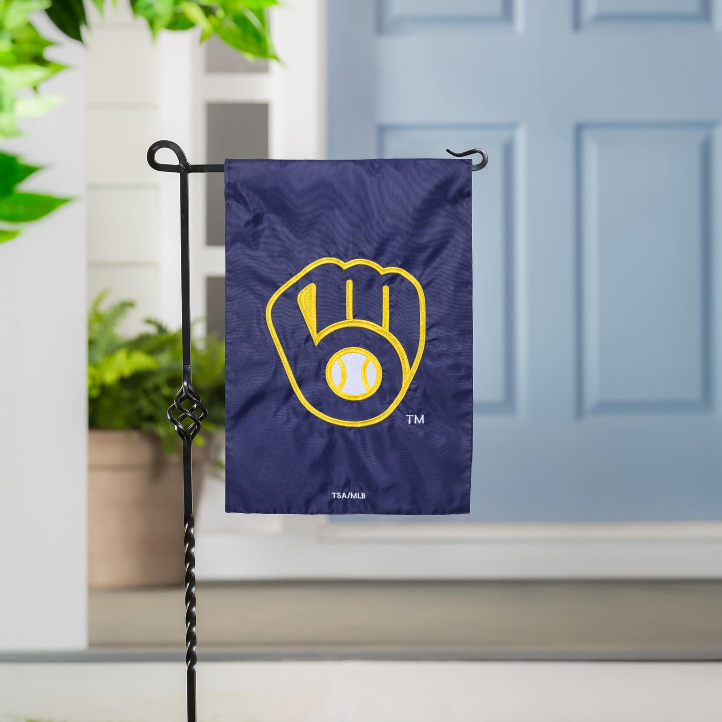 Milwaukee Brewers applique flag navy blue with yellow crest on metal garden flag stand on Tampa Home & Garden Store