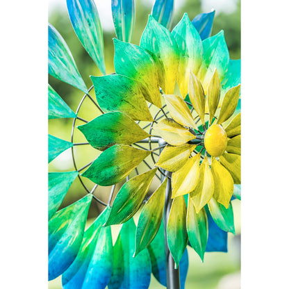 75H Wind Spinner Oceanic blades in teal, blue, and yellow on a metal frame on Tampa Home & Garden Store