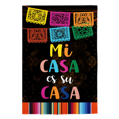Suede house flag Mi Casa Es Su Casa; colorful papel picado banners on black backdrop by Evergreen Enterprises on Tampa Home & Garden Store