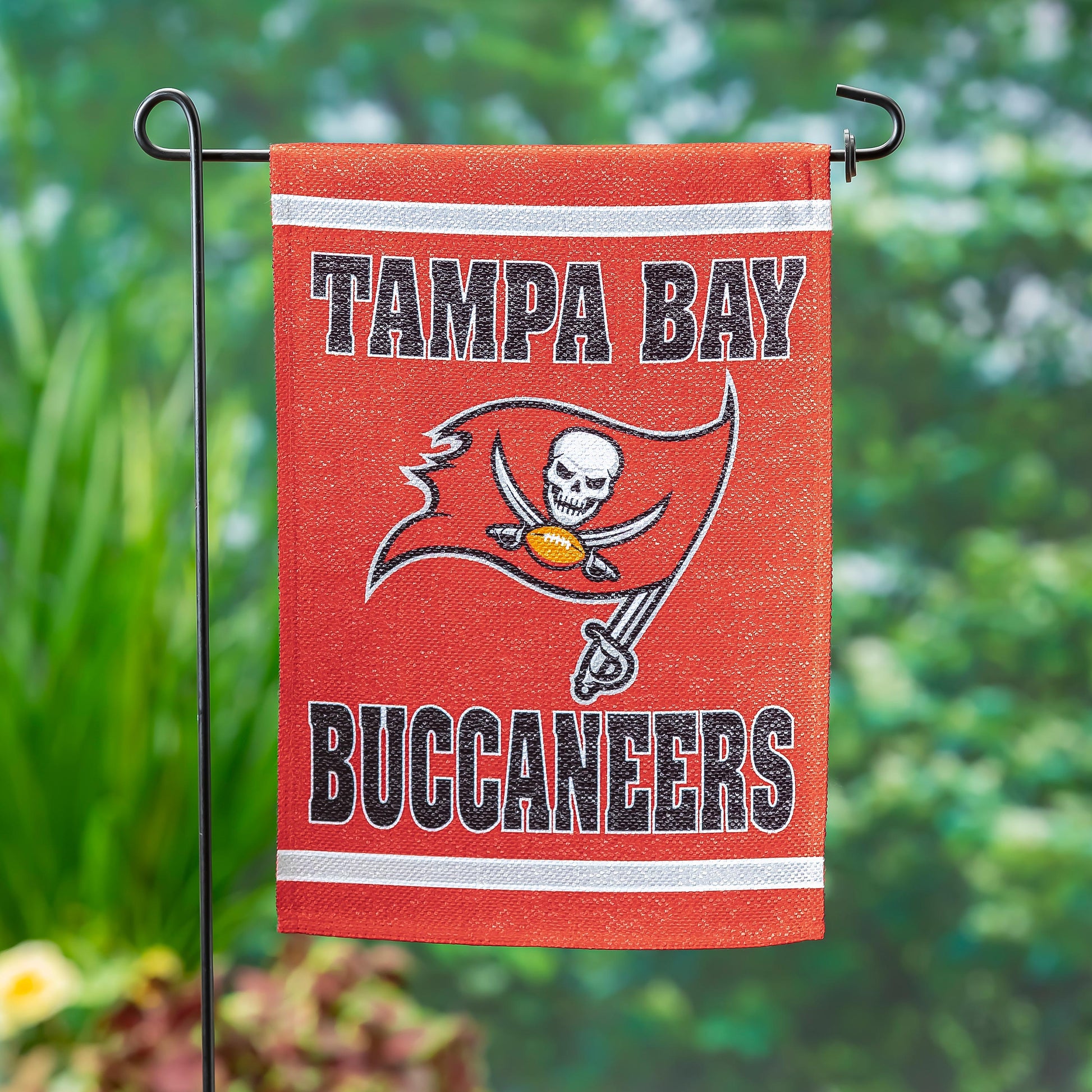 Tampa Bay Buccaneers embossed suede garden flag red with white stripe and skull logo on Tampa Home & Garden Store