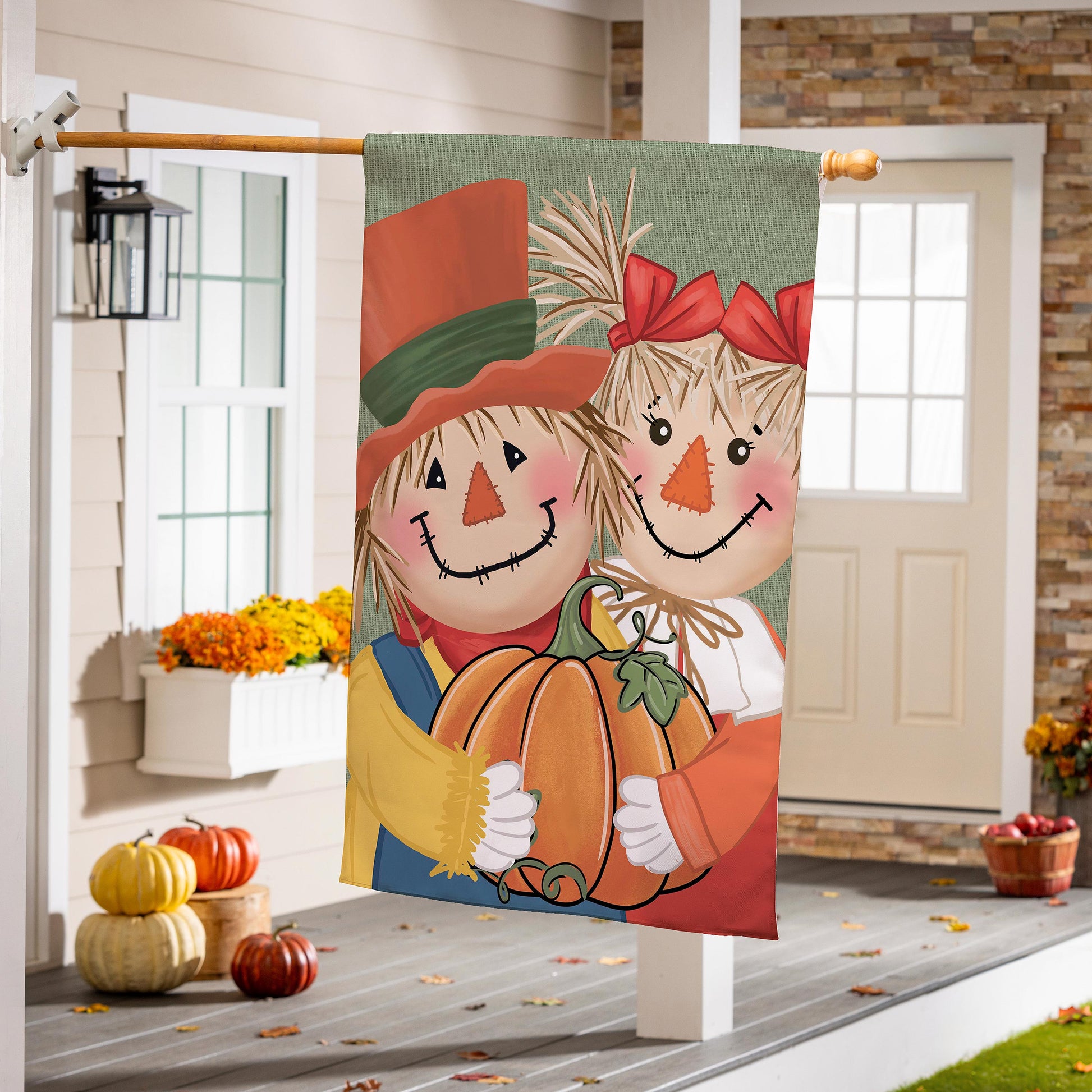 Applique house flag featuring two scarecrows in bright fall colors by Evergreen Enterprises on Tampa Home & Garden Store