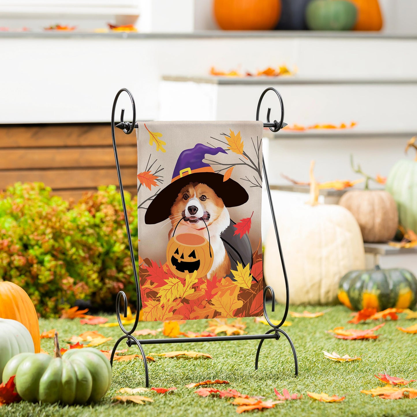 Corgi Fall Suede Garden Flag beige suede with a corgi in a witch hat among pumpkins on Tampa Home & Garden Store