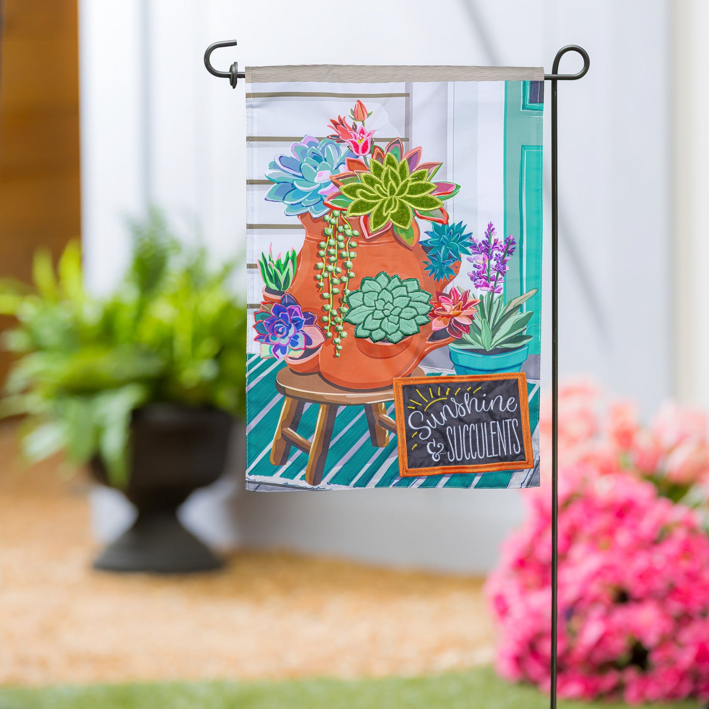 Succulent in strawberry pot applique garden flag with bright succulents in a terracotta pot on Tampa Home & Garden Store